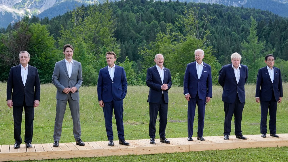 G7 leaders from left, Italy's Prime Minister Mario Draghi, Canada's Prime Minister Justin Trudeau, French President Emmanuel Macron, German Chancellor Olaf Scholz, U.S. President Joe Biden, British Prime Minister Boris Johnson, Japan's Prime Minister Fumio Kishida pose during the official G7 group photo at Castle Elmau in Kruen, near Garmisch-Partenkirchen, Germany, on Sunday, June 26, 2022. The Group of Seven leading economic powers are meeting in Germany for their annual gathering Sunday through Tuesday. (AP Photo/Martin Meissner)