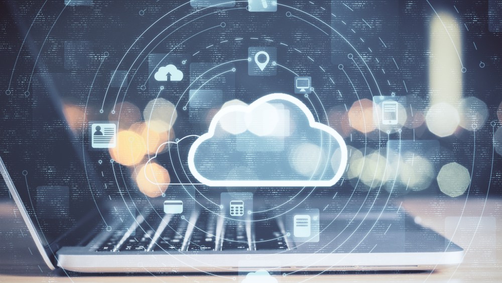 Laptop with cloud computing diagram. Cloud computing and communication concept.
