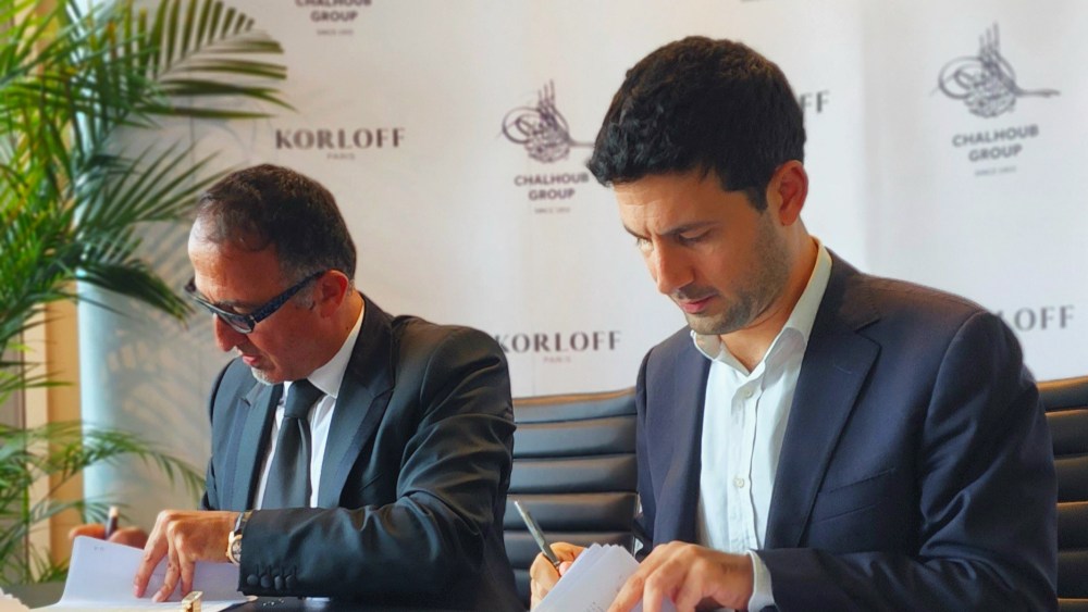 Bassam Azakir, CEO of Korloff, and Michael Chalhoub sign a partnership agreement in Dubai last week.
