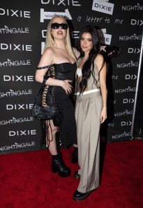 Tana Mongeau and Dixie D'Amelio at a celebration for Dixie D'Amelio's album "a letter to me" with a party at Nightingale on June 21, 2022 in Los Angeles, California.