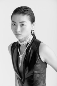 David Yurman’s high jewelry Liberty drop earrings in 18-karat white gold with diamonds. Mikimoto’s choker, Jardin Mystérieux Akoya’s cultured pearl and diamond necklace.
De Beers Jewellers’ Aria fancy color high jewelry 55.84-carat diamond necklace set in 18-karat white gold. Roxy swimsuit.