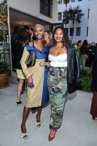 LOS ANGELES, CALIFORNIA - JUNE 02: (L-R) Derica Cole Washington and guest are seen as Moda Operandi celebrates the launch of the Ciao Lucia x Anemos  Collaboration at Villa Carlotta on June 02, 2022 in Los Angeles, California. (Photo by Stefanie Keenan/Getty Images for Anemos)