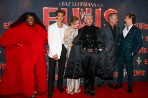 Yola, from left, Austin Butler, Olivia DeJonge, director Baz Luhrmann, Tom Hanks and Luke Bracey pose for photographers upon arrival for the premiere of the film 'Elvis' in London Tuesday, May 31, 2022. (Photo by Joel C Ryan/Invision/AP)