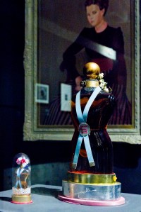 Bottles of Schiaparelli’s Shocking perfume displayed again Leonor Fini’s portrait of Elsa Schiaparelli’s daughter Gogo.