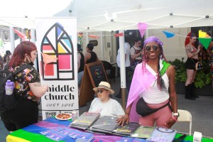 Multicultural and inclusive Middle Church runs a booth at NYC Pride street fair.