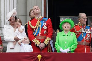 Queen Elizabeth II with Prince Philip, Prince William, Prince George, and Kate, Duchess of Cambridge holding Princess Charlotte, during the Trooping The Colour parade at Buckingham Palace, on June 11, 2016.