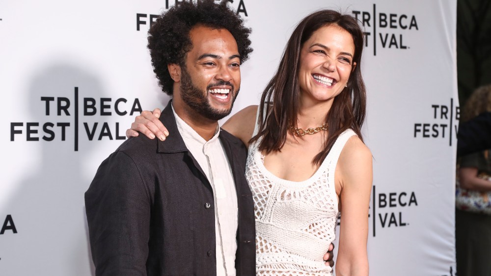 Musician Bobby Wooten III, left, and actor Katie Holmes, right, attend the premiere for "Alone Together" at SVA Theatre during the 2022 Tribeca Festival on Tuesday, June 14, 2022, in New York. (Photo by Andy Kropa/Invision/AP)
