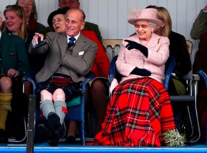 Duke of Edinburgh death. File photo dated 07/09/13 of Queen Elizabeth II accompanied by the Duke of Edinburgh attending the Braemar Gathering in Braemar. The couple had a strong bond but were different in character and the Duke of Edinburgh never shied away from telling his wife exactly what was what. Issue date: Friday April 9, 2021. Lord Charteris, the monarch's former private secretary, once recalled: "Prince Philip is the only man in the world who treats the Queen simply as another human being." See PA story ROYAL Philip Relationship. Photo credit should read: Andrew Milligan/PA Wire URN:59082027 (Press Association via AP Images)