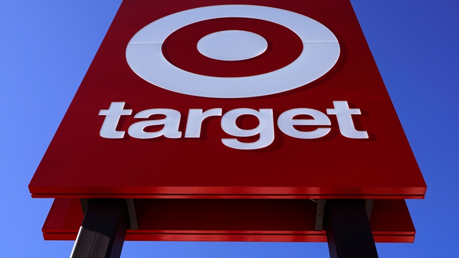 The bullseye logo on a sign outside a Target store is seen on Feb. 28, 2022. Target's first-quarter profit took a big hit from higher costs, despite strong sales growth. Target announced Tuesday, June 7, 2022, it is canceling orders from its suppliers, particularly in home and clothing, while slashing prices of goods in a bold move to clear out mounds of unwanted inventory ahead of the critical fall and holiday shopping seasons.