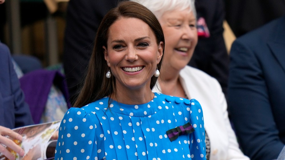 Kate, Duchess of Cambridge sits in the Royal box on Centre Court ahead of the men's singles quarterfinal match between Serbia's Novak Djokovic and Italy's Jannik Sinner on day nine of the Wimbledon tennis championships in London, Tuesday, July 5, 2022. (AP Photo/Alastair Grant)