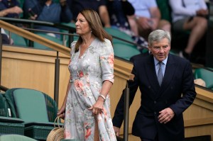 Carole and Michael Middleton, the parents of Kate, Duchess of Cambridge arrive in the Royal box on Centre Court ahead of the men's singles quarterfinal match between Serbia's Novak Djokovic and Italy's Jannik Sinner on day nine of the Wimbledon tennis championships in London, Tuesday, July 5, 2022. (AP Photo/Alastair Grant)