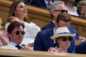 Britain's Princess Beatrice and her husband Edoardo Mapelli Mozzi sit in the Royal Box on Centre Court to watch Serbia's Novak Djokovic and Britain's Cameron Norrie play in a men's singles semifinal on day twelve of the Wimbledon tennis championships in London, Friday, July 8, 2022. (AP Photo/Alastair Grant)