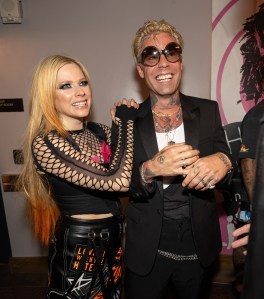 Avril Lavigne and Mod Sun backstage during Machine Gun Kelly: "Mainstream Sellout Tour" at the Kia Forum on July 13, 2022 in Inglewood, California.