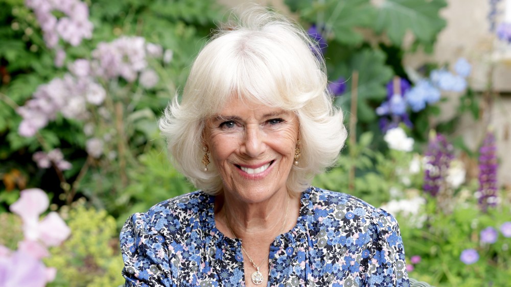 WILTSHIRE, UNITED KINGDOM – JULY 15: (NO SALES. STRICTLY FOR EDITORIAL USE ONLY. NOT FOR USE AFTER JULY 24, 2022 WITHOUT PRIOR PERMISSION FROM CLARENCE HOUSE) In this handout image provided Clarence House and released on July 15 2022, HRH Camilla, Duchess of Cornwall poses for an official portrait to mark HRH's 75th birthday at her home in Wiltshire, United Kingdom. (Photo by Chris Jackson / Clarence House via Getty Images).