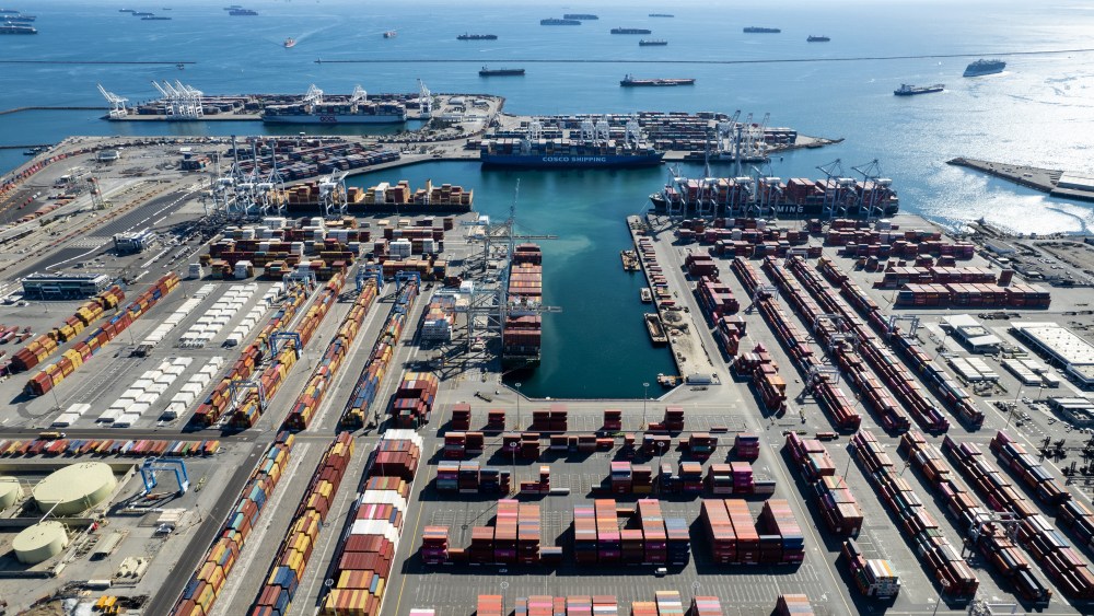 LONG BEACH, CA - OCTOBER 16: Aerial view of container ships waiting to enter and unload at Port of Long Beach on October 16, 2021 in Long Beach, California. (Photo by Qian Weizhong/VCG via Getty Images)