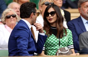 LONDON, ENGLAND - JULY 06: Dominic Cooper and Gemma Chan watch on during the match between Rafael Nadal of Spain and Taylor Fritz of The United States during their Men's Singles Quarter Final match on day ten of The Championships Wimbledon 2022 at All England Lawn Tennis and Croquet Club on July 06, 2022 in London, England. (Photo by Clive Brunskill/Getty Images)