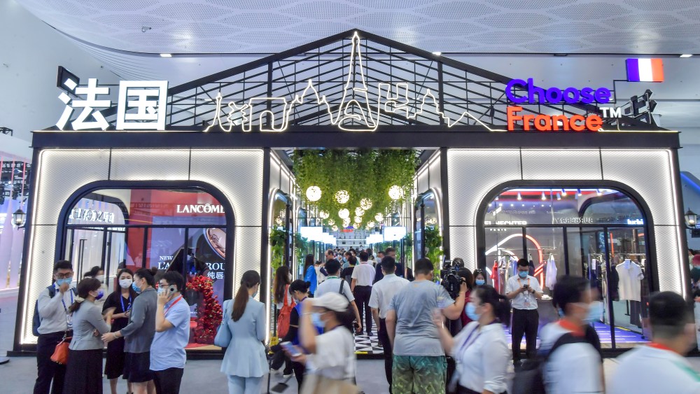 People visit France booth during the 2nd China International Consumer Products Expo at the Hainan International Convention and Exhibition Center