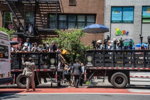Press outside the memorial.
