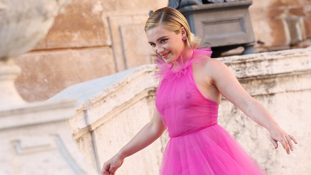 Florence Pugh pink sheer valentino dress attends the Valentino Haute Couture Fall/Winter 22/23 fashion show on July 08, 2022 in Rome, Italy. (Photo by Vittorio Zunino Celotto/Getty Images)