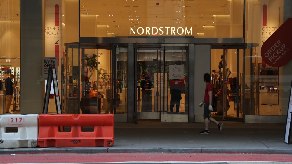 NEW YORK, NEW YORK - JULY 13: A person walks by Nordstrom flagship store in Midtown Manhattan as New York City moves into Phase 3 of re-opening following restrictions imposed to curb the coronavirus pandemic on July 13, 2020. Phase 3 permits the reopening of nail and tanning salons, tattoo parlors, spas and massages, dog runs and numerous other outdoor activities. Phase 3 is the third of four-phased stages designated by the state.  (Photo by Rob Kim/Getty Images) (Photo by Rob Kim/Getty Images)