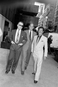 Karl Lagerfeld, Oscar de la Renta, and Issey Miyake pose for a portrait outside the Four Seasons Hotel in New York City on April 12, 1984.
