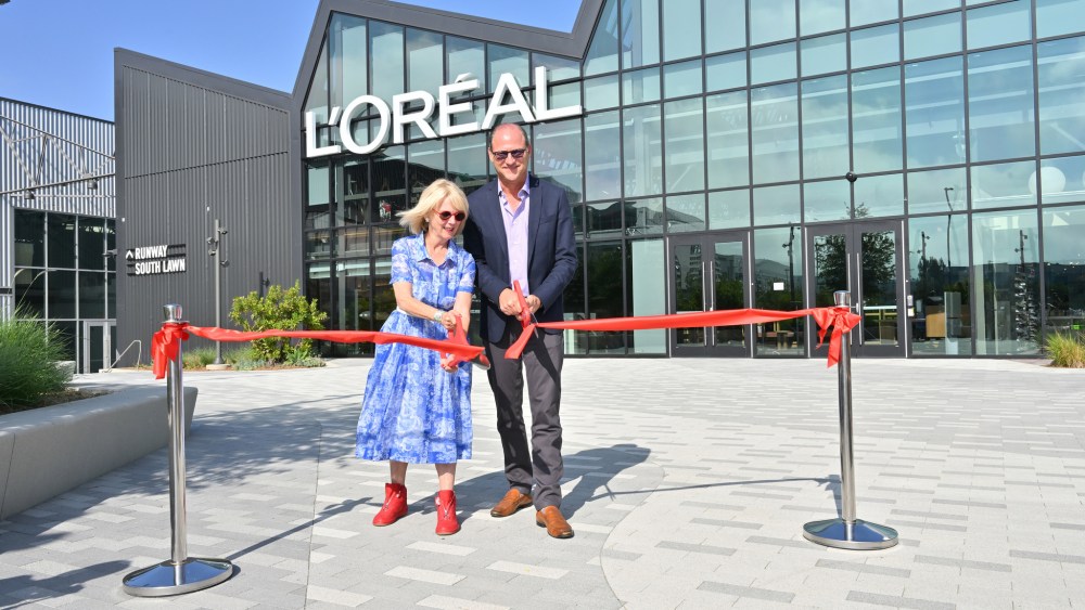 Carol Hamilton, Group President, Acquisitions and West Coast Headquarters, L'Oréal, and David Greenberg, CEO, L'Oréal USA | President, North America, cut the ceremonial ribbon at the L’Oreal Los Angeles Headquarters in El Segundo, California on August 23, 2022.