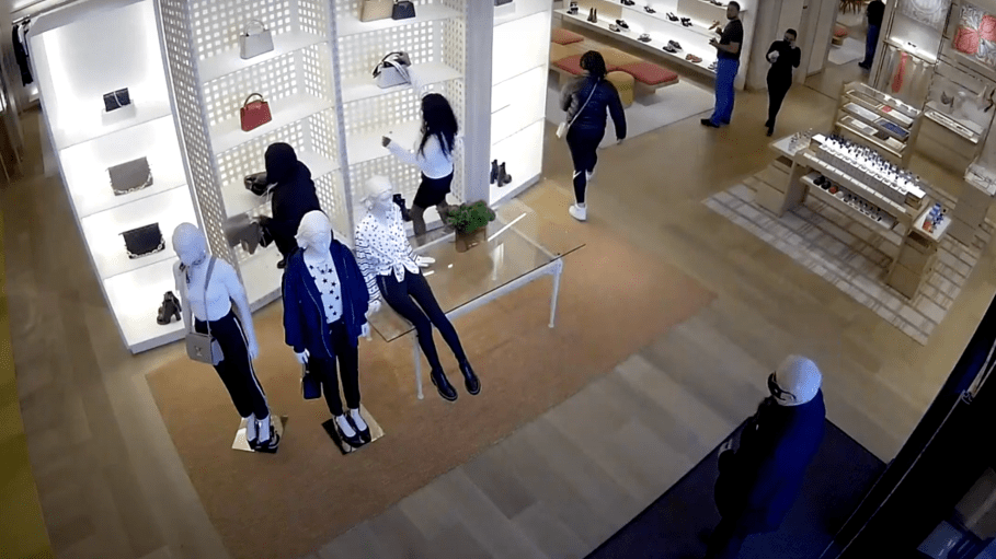 Camera footage of three suspects stealing handbags in the theft of a Bellevue, Wash. Louis Vuitton store.