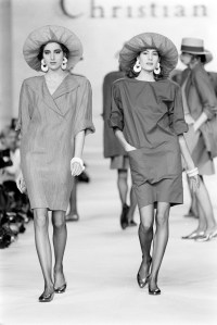 Models walk the runway in Christian Dior's chemise dresses for spring 1987 designed by Marc Bohan.