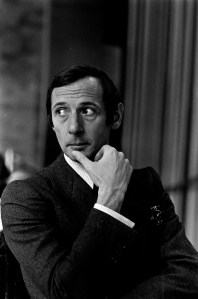 Marc Bohan poses for portraits during a visit to The Museum of Modern Art  for his second viewing of "The Machine" exhibition on February 7, 1969 in New York City.