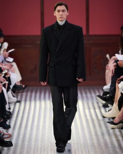 Li Yifeng walks in Prada's fall 2022 repeat show in Beijing.
