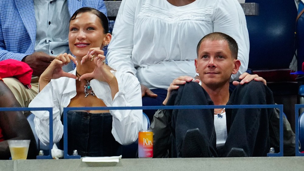NEW YORK, NEW YORK - AUGUST 29: Bella Hadid and Marc Kalman look on during the Women's Singles First Round match between Serena Williams of the United States and Danka Kovinic of Montenegro on Day One of the 2022 US Open at USTA Billie Jean King National Tennis Center on August 29, 2022 in the Flushing neighborhood of the Queens borough of New York City. (Photo by Gotham/GC Images)