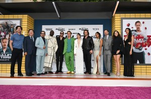 (L-R) Logan Lerman, Masi Oka, Hiroyuki Sanada, Brian Tyree Henry, Bad Bunny, Brad Pitt, Joey King, Aaron Taylor-Johnson, Zazie Beetz, David Leitch, Kelly McCormick and Andrea Muñoz arrive at the Los Angeles premiere of "Bullet Train" held at Regency Village Theatre on August 1, 2022 in Los Angeles, California.