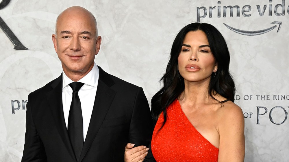 LONDON, ENGLAND - AUGUST 30:  Jeff Bezos and Lauren Sanchez wearing a red dress attend "The Lord of the Rings: The Rings of Power" World Premiere in Leicester Square on Aug. 30, 2022 in London, England. (Photo by Gareth Cattermole/Getty Images)