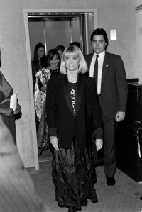 Olivia Newton-John (foreground) and guests attend an event at a Neiman-Marcus retail store in San Francisco, California, on March 25, 1987.
