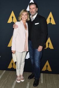 BEVERLY HILLS, CA - AUGUST 15:  Olivia Newton-John and John Travolta attend The Academy Presents "Grease" (1978) 40th Anniversary at Samuel Goldwyn Theater on August 15, 2018 in Beverly Hills, California.  (Photo by Jon Kopaloff/FilmMagic)