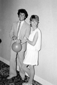 Matt Lattanzi and Olivia Newton-John attend an event in Los Angeles, California, on June 15, 1981.