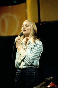 UNSPECIFIED - JANUARY 01:  Photo of OLIVIA NEWTON-JOHN; Olivia Newton John performing on stage  (Photo by Fin Costello/Redferns)
