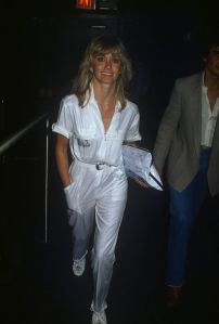Olivia Newton-John in a white pants suit; circa 1970; New York. (Photo by Art Zelin/Getty Images)