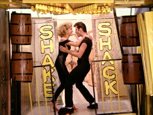 LOS ANGELES - JUNE 16: The movie "Grease", directed by Randal Kleiser. Seen here from left, Olivia Newton-John as Sandy and John Travolta as Danny Zuko singing 'You're the One That I Want.'  Initial theatrical release of the film, June 16, 1978. Screen capture. Paramount Pictures. (Photo by CBS via Getty Images)