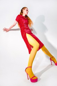 Stuart Weitzman’s Nudistcurve Hollywood Shine platform. Derek Lam 10 Crosby polyester geo stretch velvet printed dress; Letra gold rings.