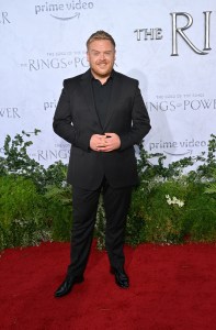 Owain Arthur arrives at the Los Angeles premiere of the Prime Video series "Lord of the Rings: The Rings of Power" held at The Culver Studios on August 15, 2022 in Los Angeles, California