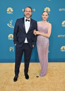 Thomas Sadoski in Armani and Amanda Seyfried in Armani Prive on the 2022 Emmy Awards red carpet.