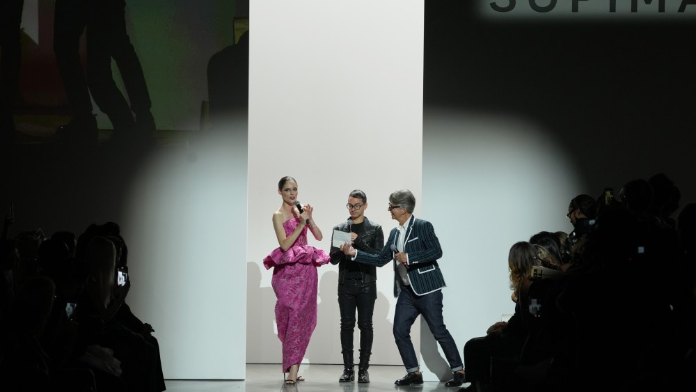 NEW YORK, NEW YORK - SEPTEMBER 10: (L-R) Coco Rocha, Christian Siriano and Buxton Midyette speak on the runway during the 15th Annual Supima Design Competition on September 10, 2022 in New York City. (Photo by Bennett Raglin/Getty Images for Supima)