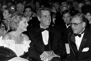 Barbara Walters, Rock Hudson, and guest attend a party, benefitting the Southwest Film/Video Archives, at the Dallas, Texas, location of Bloomingdale's (plus a tent outside the store) on November 20, 1984.