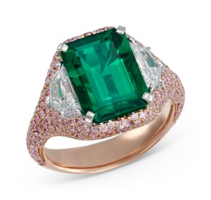 Muzo x Argyle’s platinum and 18-karat pink gold ring with step-cut Muzo emerald flanked by white diamonds.