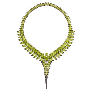 Stephen Webster’s “No Regrets,” Magnipheasant Feather Collar in 18-karat white gold with Fuli Gemstone peridots, and black-and-white diamond pavé.