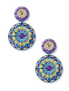 Chopard’s “Red Carpet Collection” earrings in titanium set with round-cut sapphires, round-cut amethysts, square-shaped yellow diamonds and brilliant-cut white diamonds.