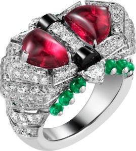 Cartier’s Beautés du Monde high jewelry ring in white gold, two cabochon-cut rubies, two half- moon-shaped diamonds, triangular-shaped emeralds, emerald beads, onyx, and brilliant-cut diamonds.