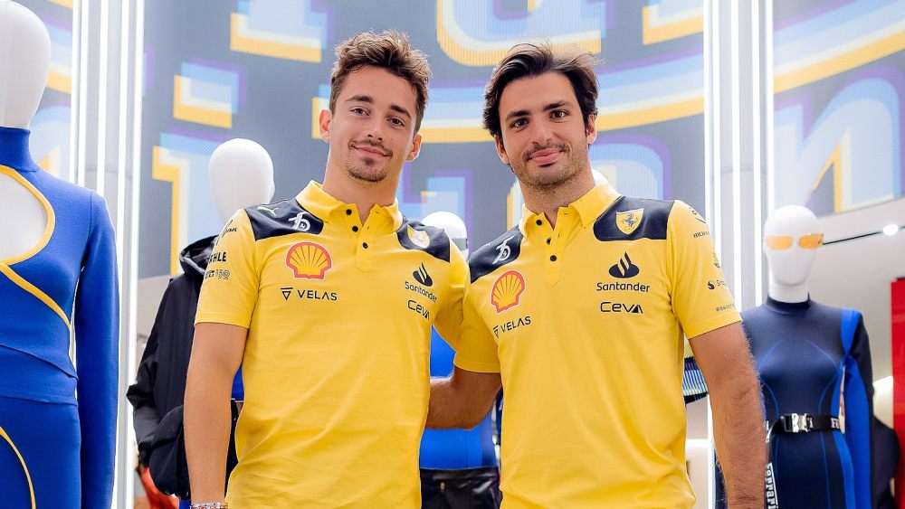 Scuderia Ferrari's drivers Charles Leclerc and Carlos Sainz at the Ferrari store in Milan.