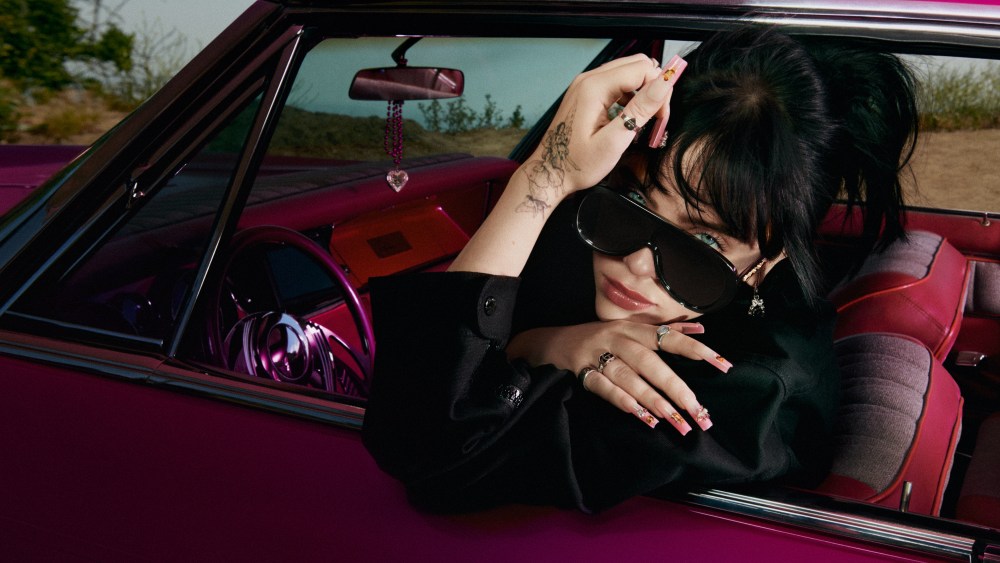Billie Eilish models in the Gucci eyewear campaign.